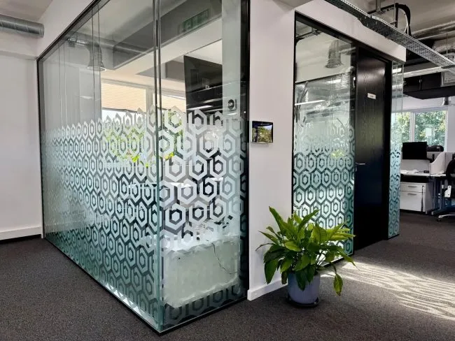 Office breakout area with colourful mural