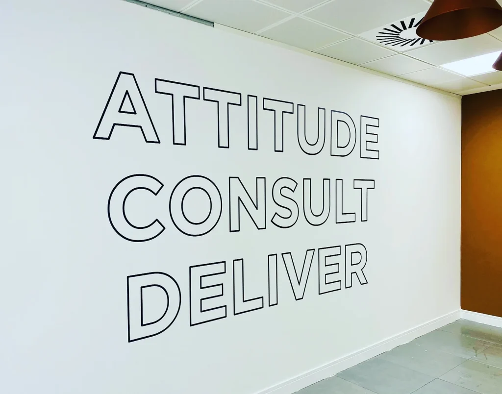 Cut vinyl lettering on an office wall